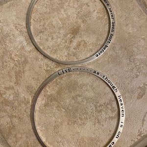 Two sterling silver stamped bracelets